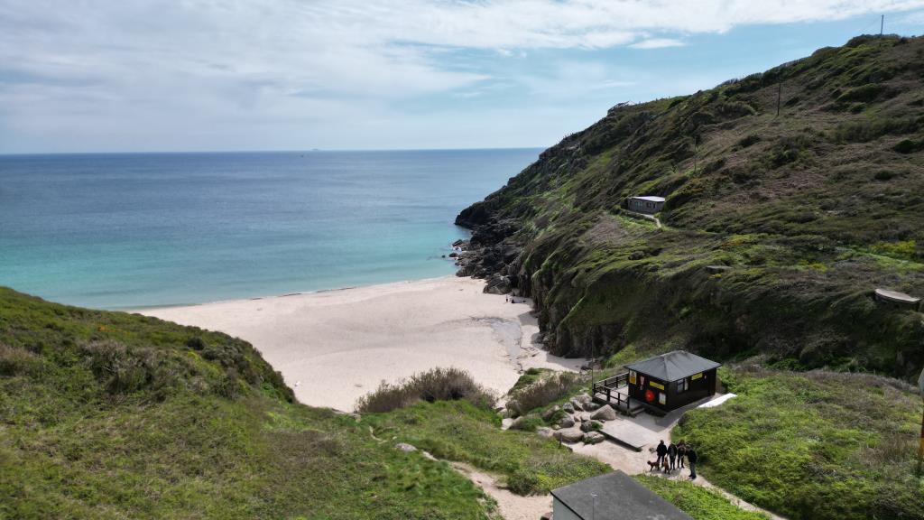 Lot: 69 - DETACHED RESIDENTIAL PROPERTY ENJOYING BREATHTAKING SEA VIEWS IN TRULY STUNNING LOCATION - Drone photo of beach and property in distance